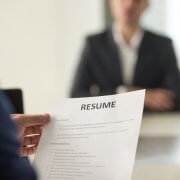 job interview in which applicant undergoes pre-employment screening