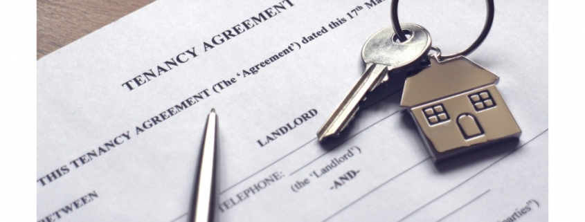 signing a tenancy agreement to receive keys to house
