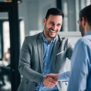 background check provider shaking hands at interview