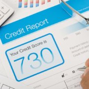 Credit reports with score on a desk
