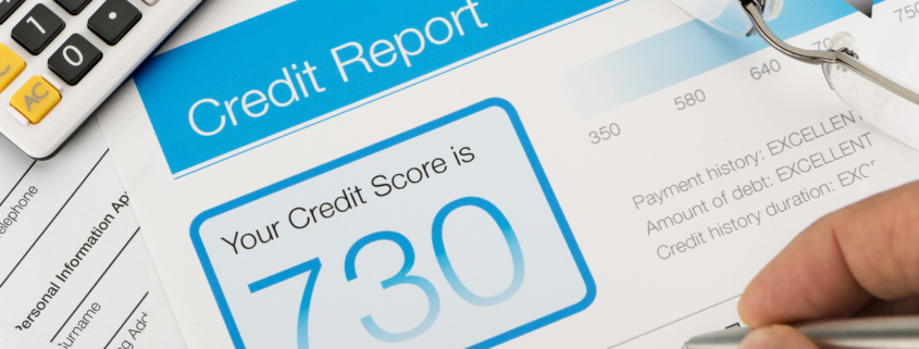Credit reports with score on a desk